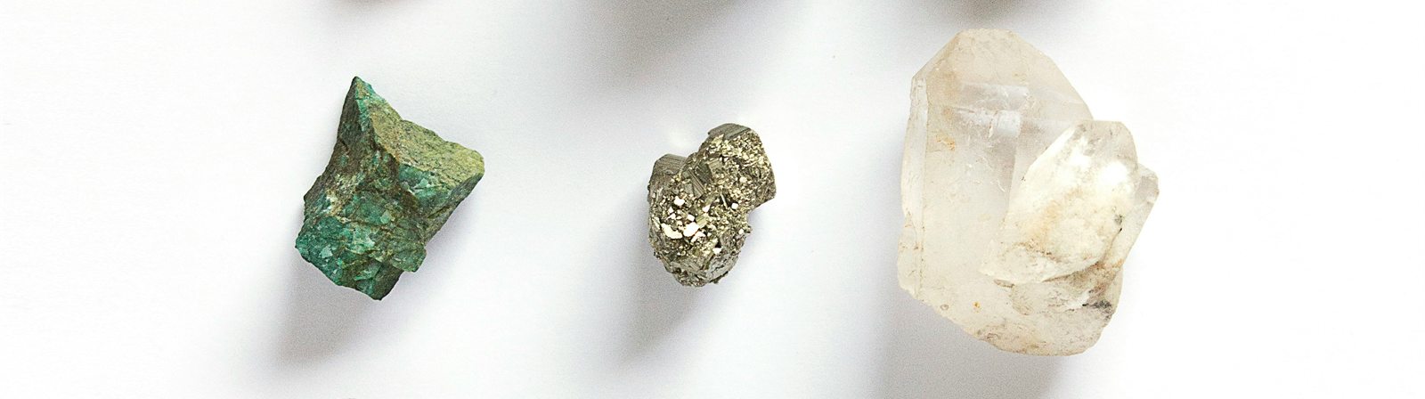 Loose cut gemstones laid out for grading